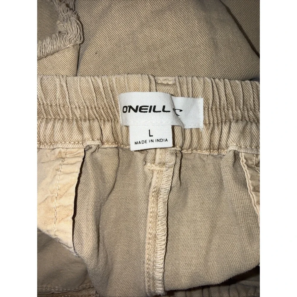 O'Neill Cream colored denim cut off denim Jean shorts women's size L